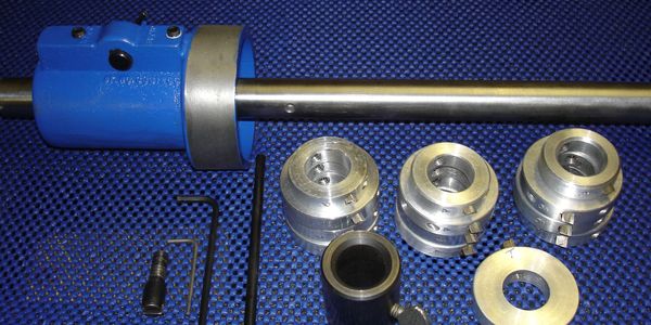 New and rebuilt line bore bars — pneumatic cylinder kit with components